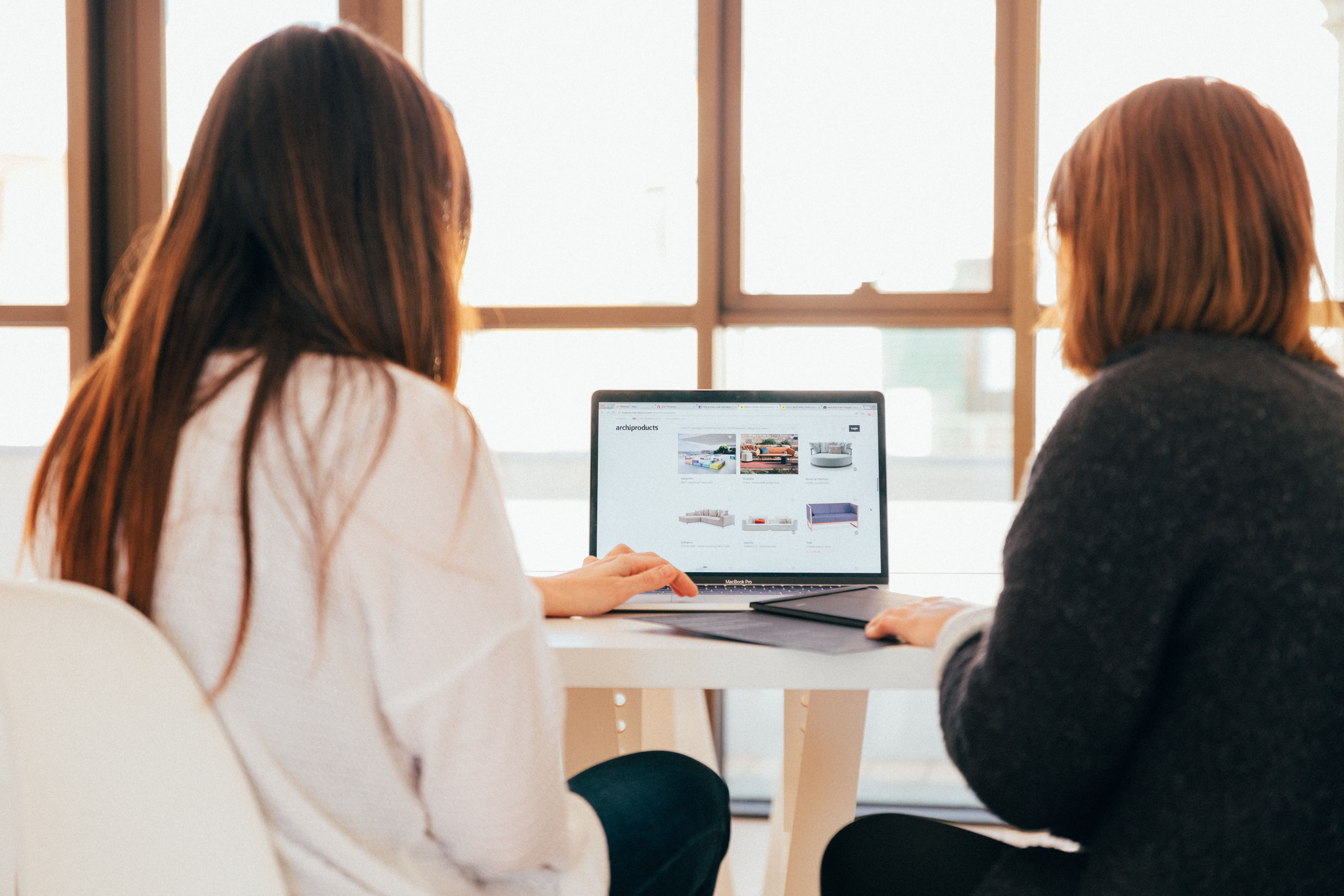 woman presenting using a laptop