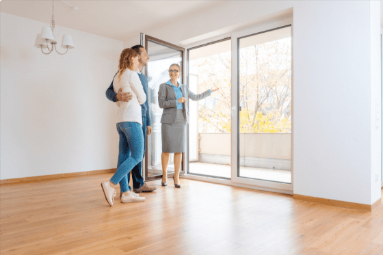 Couple Getting Tour through Apartment